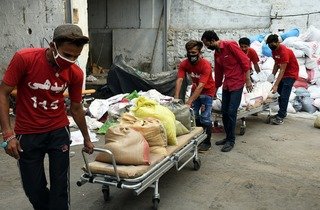 Food packs containing essential food supplies for poor families